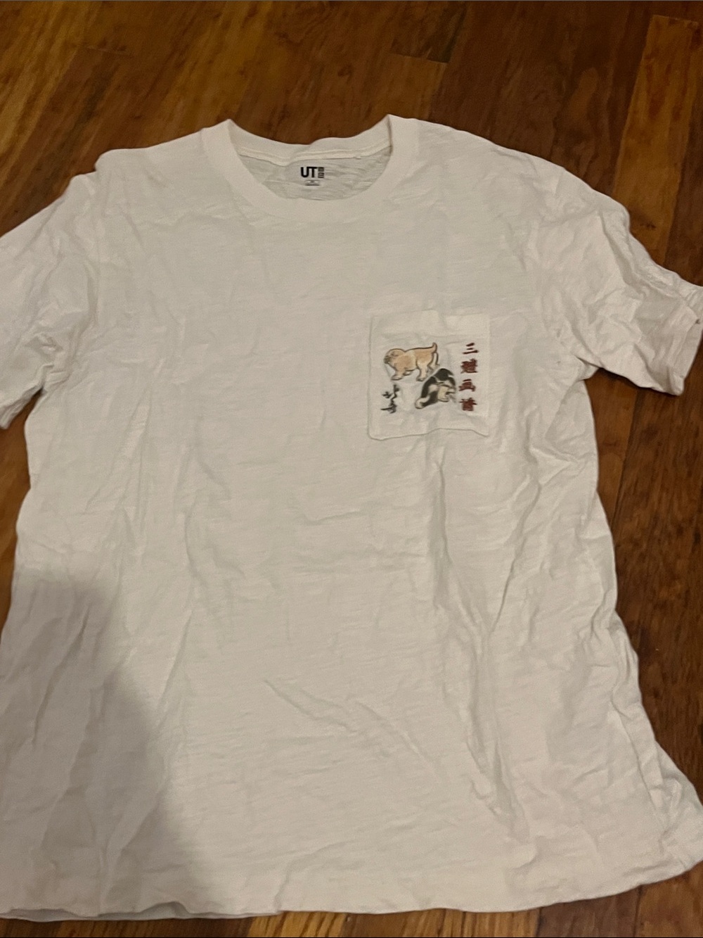 Uniqlo White Pocket Tee with Dog Graphic